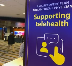 Sign supporting advocacy efforts supporting telemedicine at the American Medical Association (AMA) annual meeting of its House of Delegates. Telehealth sign at the AMA 2022 meeting. Photo by Dave Fornell