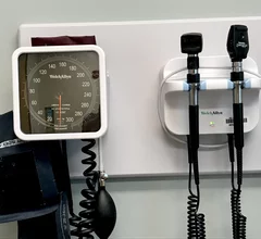 Doctor's office blood pressure cuff and odoscope. Hypertension. The WISEWOMAN program proved to be a useful intervention to screen low-income, uninsured women and offer them risk reduction counseling to improve blood pressure, diet and physical activity.