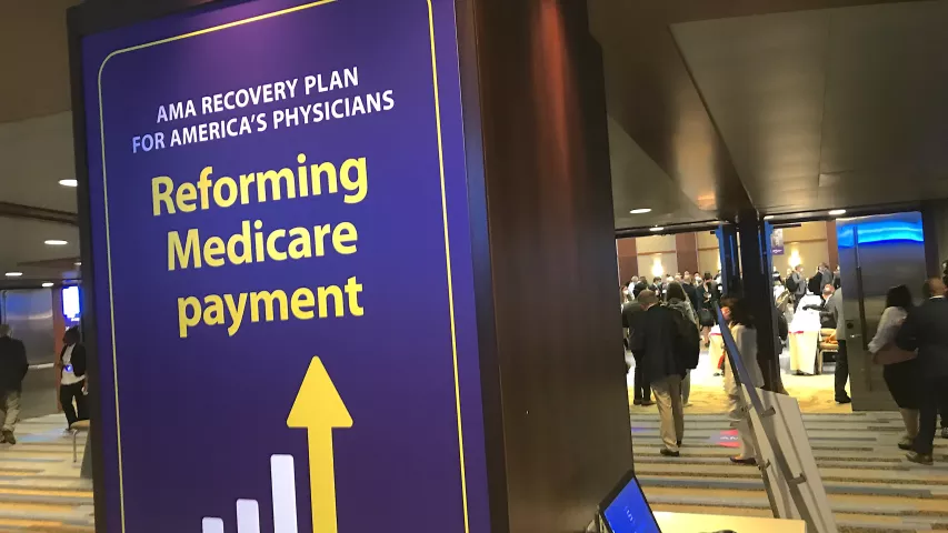 The common area outside the AMA House of Delegates meeting hall included several posters that note some of the key policies of the American Medical Association, including fighting reductions in Medicare reimbursements. The AMA actively lobbies Congress to prevent cuts and support physicians. AMA #AMA22 #AMA2022 #AMA175 #AMAmtg