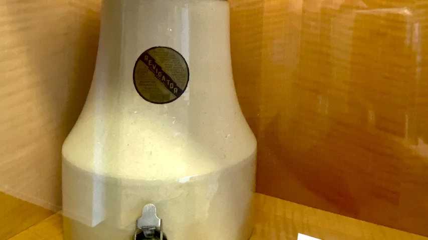 The Radium Ore Revigator water jar was supposedly lined with radioactive material. Marketing materials claimed that when the jug's radioactive component mixed with water, it created a "cure-all" tonic for consumption. Radioactive water cooler advertised to help improve health. Part of the medical quackery display at the AMA headquarters in Chicago. Photo by Dave Fornell