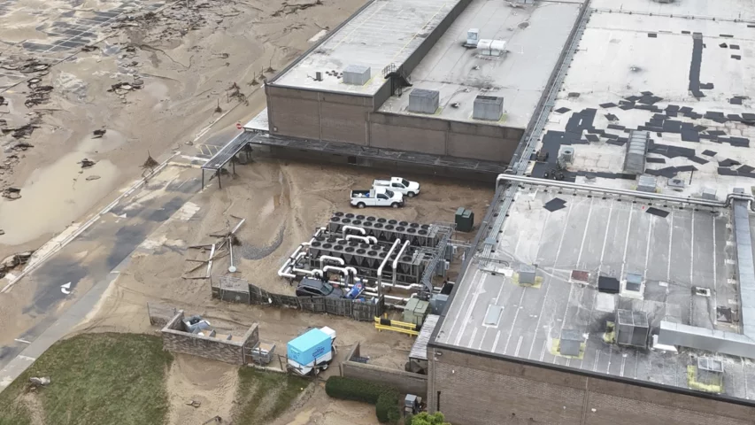 Mud and debris around the Baxter North Cove facility. Photo by Aerial Lens.