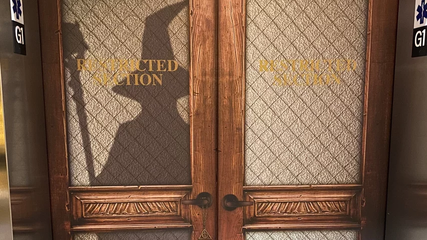 Harry Potter inspired Hogwarts library elevator door in the Library building at Epic.