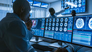 Over the Shoulder Shot CT Brain Scan Images