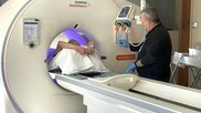 Technologist sets up a patient for a CT scan with IV contrast at Wellstar Kennestone Hospital. Photo by Dave Fornell