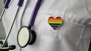 Doctor with Pride pin LGBT