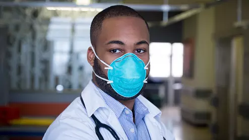 Doctor wearing a COVID N95 mask in the hospital. #Coronavirus #COVID19 #Sarscov2