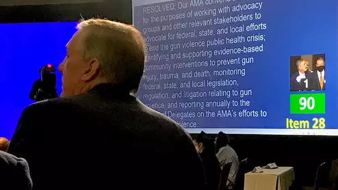 AMA Board of Trustees member Scott Ferguson, MD, a diagnostic radiologist, offers comment during the discussion on one of several policies to further curb gun violence. #AMA #AMAmtg #AMA175