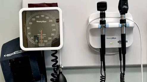 Doctor's office blood pressure cuff and odoscope. Hypertension. The WISEWOMAN program proved to be a useful intervention to screen low-income, uninsured women and offer them risk reduction counseling to improve blood pressure, diet and physical activity.