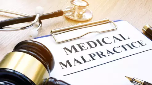 Medical malpractice gavel diagnostic error mistake stethoscope