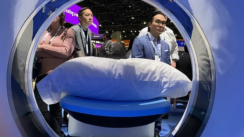 RSNA attendees through bore of the new release Philips CT 5300 scanner at RSNA 2024. Three new CT systems were released at RSNA that included numerous AI enhancements. Photo by Dave Fornell. #RSNA #RSNA24 #RSNA2024