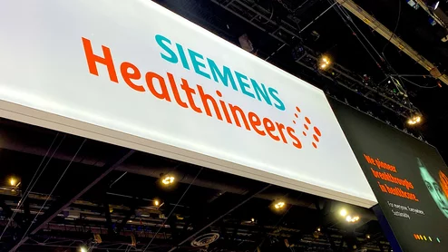 Siemens Healthineers booth sign at RSNA 2024. The company expects to spend about between $227-$340 million on tariff mitigation efforts.Photo by Dave Fornell