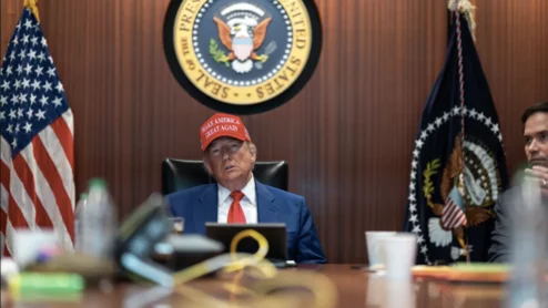 President Donald Trump with MAGA hat, White House press photo