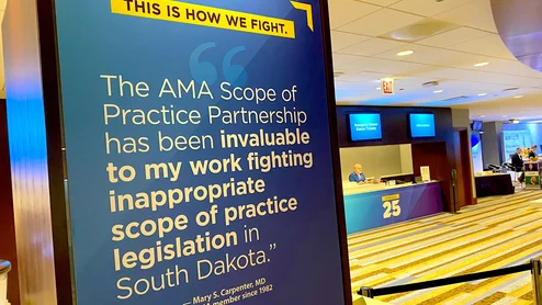 The AMA is fighting practice scope creep of non-physicians. Poster at AMA Hiouse of Delegates 2025 meeting. Photo by Dave Fornell