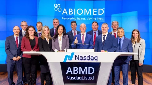 Michael Minogue (center) and other Abiomed representatives. Image courtesy of Minogue's campaign.