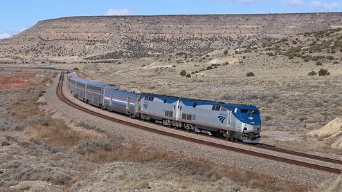 Amtrak eastbound Southwest Chief about to pass under Route 66