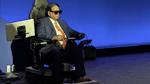 Sudhir Srivastava, MD, conducting a live long-distance cardiac telesurgery at the EACTS 2026 annual meting, utilizing the SSi MantrAsana tele-surgeon console. The system enables 3D imaging to help the surgeon better understand the spacial relations of the anatomy where they are working.