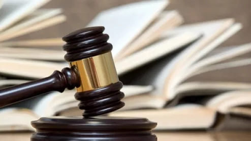 Gavel with paperwork.