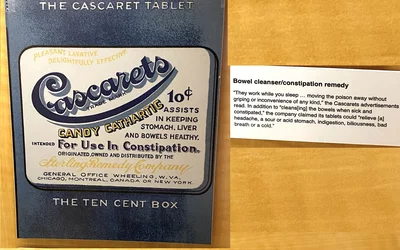 "They work while you sleep ... moving the poison away without griping or inconvenience of any kind," the Cascarets advertisements read. In addition to "cleansing the bowels when sick and constipated," the company claimed its tablets could "relieve headache, a sour or acid stomach, indigestion, biliousness, bad breath or a cold." Today the active ingredient, cascara segrada, is only available as a dietary supplement and not a drug. Part of quackery, snake oil, medical frauds display at the AMA headquarters.