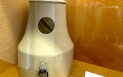 The Radium Ore Revigator water jar was supposedly lined with radioactive material. Marketing materials claimed that when the jug's radioactive component mixed with water, it created a "cure-all" tonic for consumption. Radioactive water cooler advertised to help improve health. Part of the medical quackery display at the AMA headquarters in Chicago. Photo by Dave Fornell