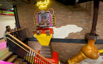 The Chocolate factory office building at Epic features a three story stairwell that replicates parts of the Willy Wonka chocolate factory production. Wiley Wonka themed office at Epic HQ. Photo by Dave Fornell